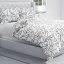 Bavlněné ložní povlečení Sandra SA-570 Abstraktní tváře na bílém - detail 1 - Biante.cz
