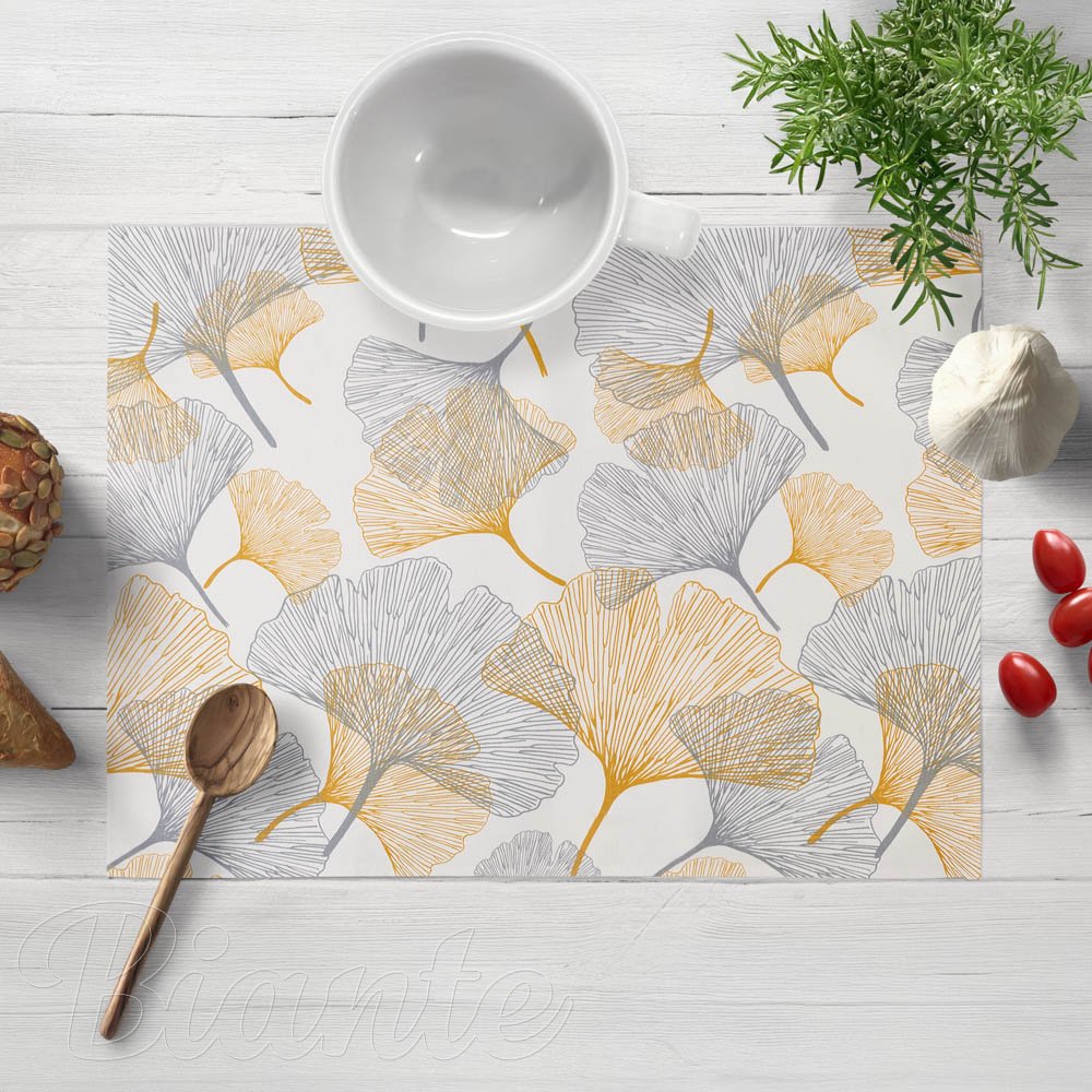 Bavlněné prostírání na stůl Sandra SA-745 Šedo-hořčicové ginkgo listy na bílém - Biante.cz